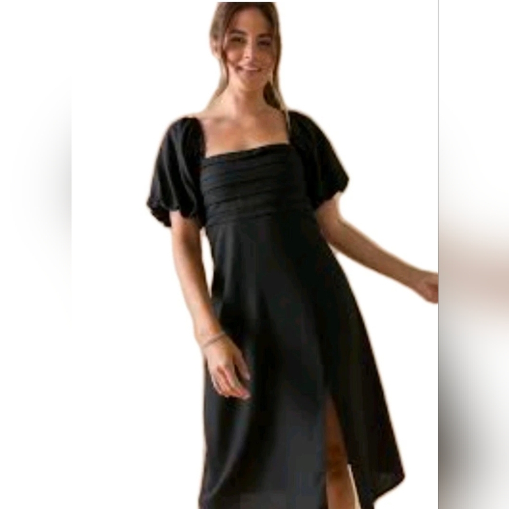 Elisa Puff Sleeve Midi Dress

From Francesca's